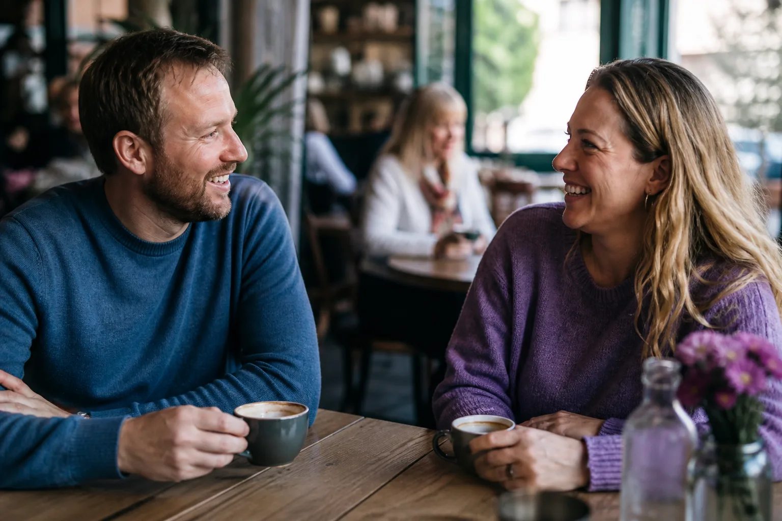 Two Berkshire singles chatting over coffee beside the River Thames